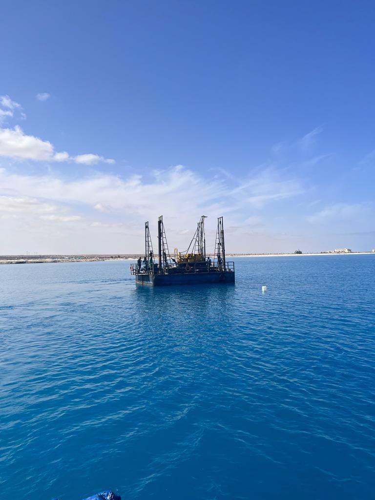 Marine geotechnical drilling from a floating pontoon on an Egyptian offshore project